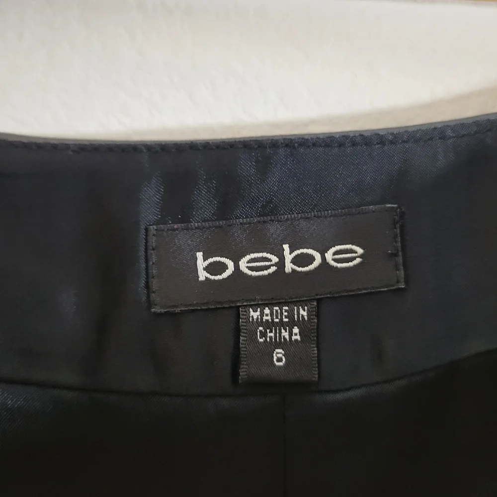 BEBE black soft faux fur genuine leather zip front gothic punk edgy mini skirt
